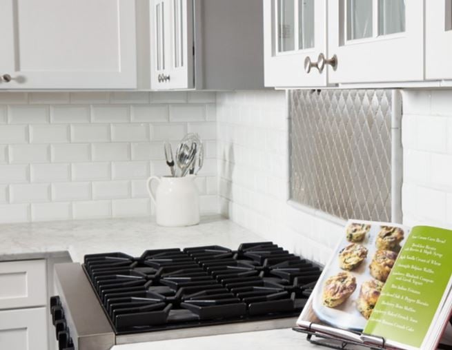 Bianco Carrara Honed Marble Kitchen Countertop with Bevel Subway Cotton Glossy Porcelain Tile Backsplash from Arizona Tile