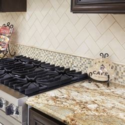 Subway Cream Backsplash with SL-Cottage Melange and Golden Crystal Granite