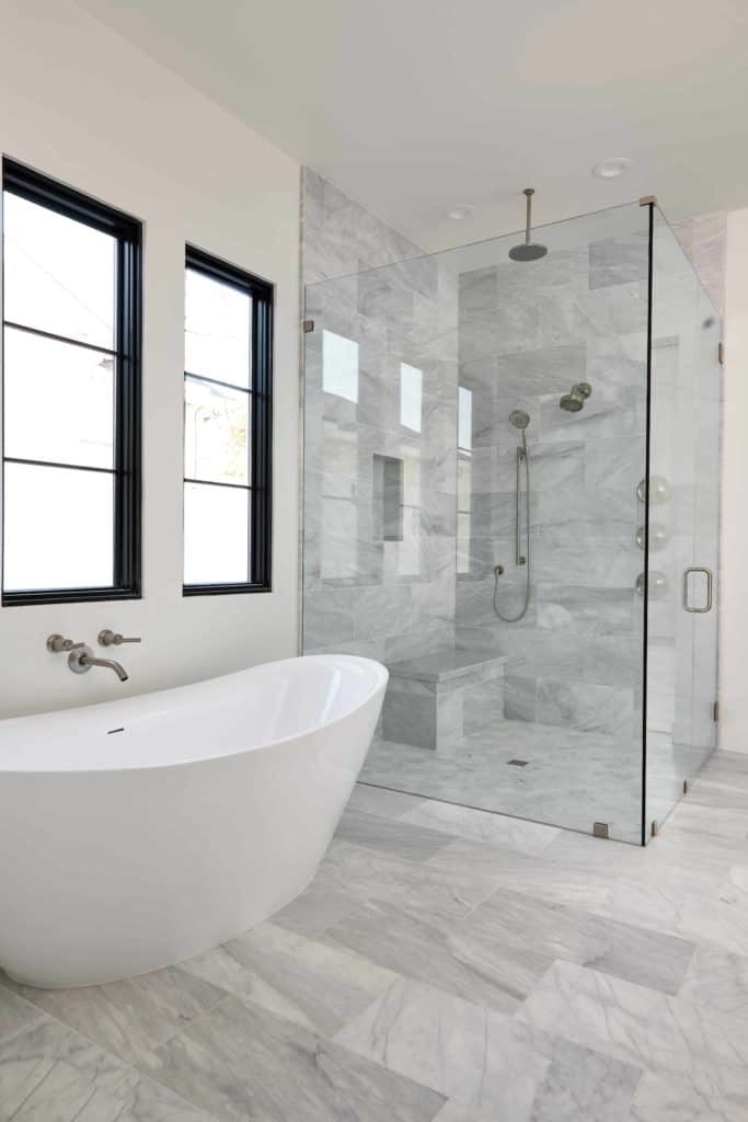 Bathroom tub and glass enclosed shower - Fairmount Development Design using Arizona Tile