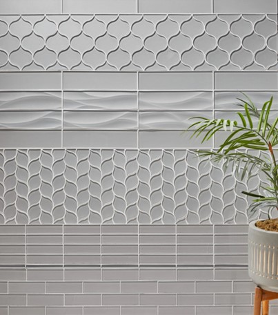Dunes Denim 3 x 12 Flat, Arabesque Mosaic, 3 x 12 Wave, Leaves Mosaic,1-1/2 x 6 Straight Stack, and 2 x 6 Stagger Joint Glass Wall Tile from Arizona Tile