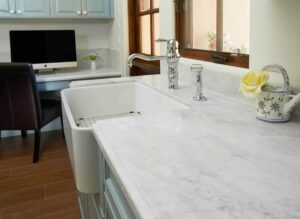 Bianco Carrara marble Kitchen Countertop with Farmhouse Sink from Arizona Tile